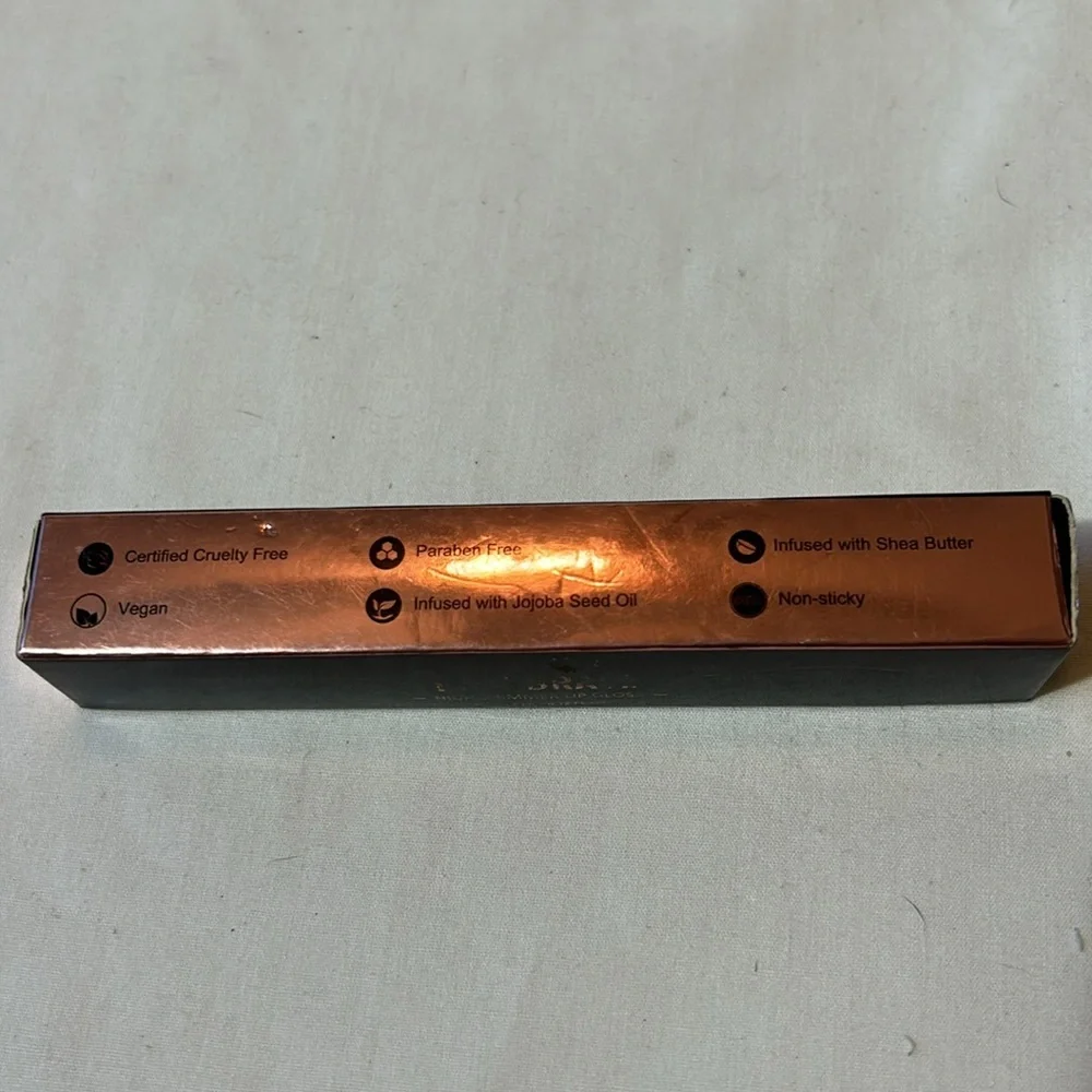 RealHer High Shimmering Lip Gloss- I Am Brave-ShimmerSilver  NIB